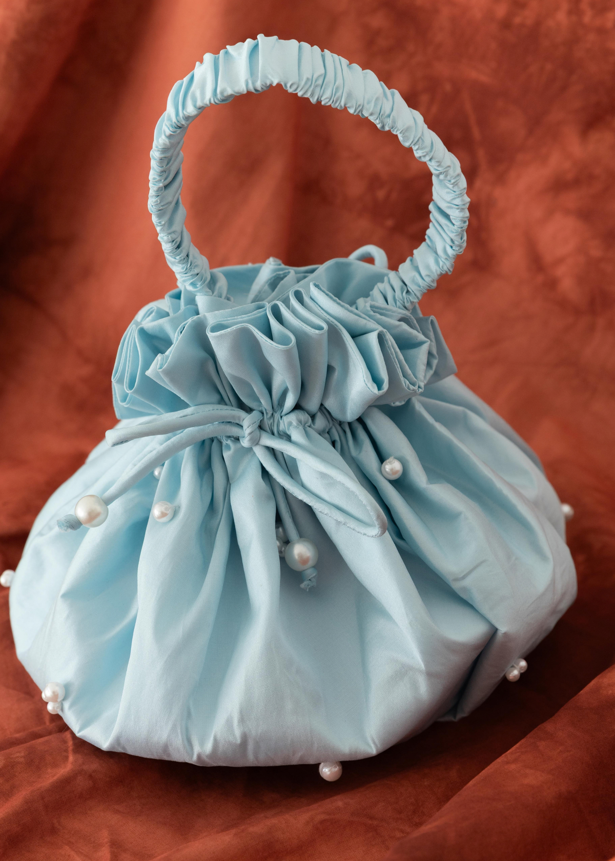 Celia Potli Bag I Blue
